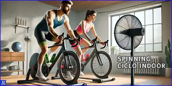 Pareja de ciclistas practicando spinning o ciclo indoor - con un ventilador en casa